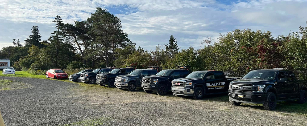 Blacktop Traffic Service equipment yard and fleet vehicles in Nova Scotia